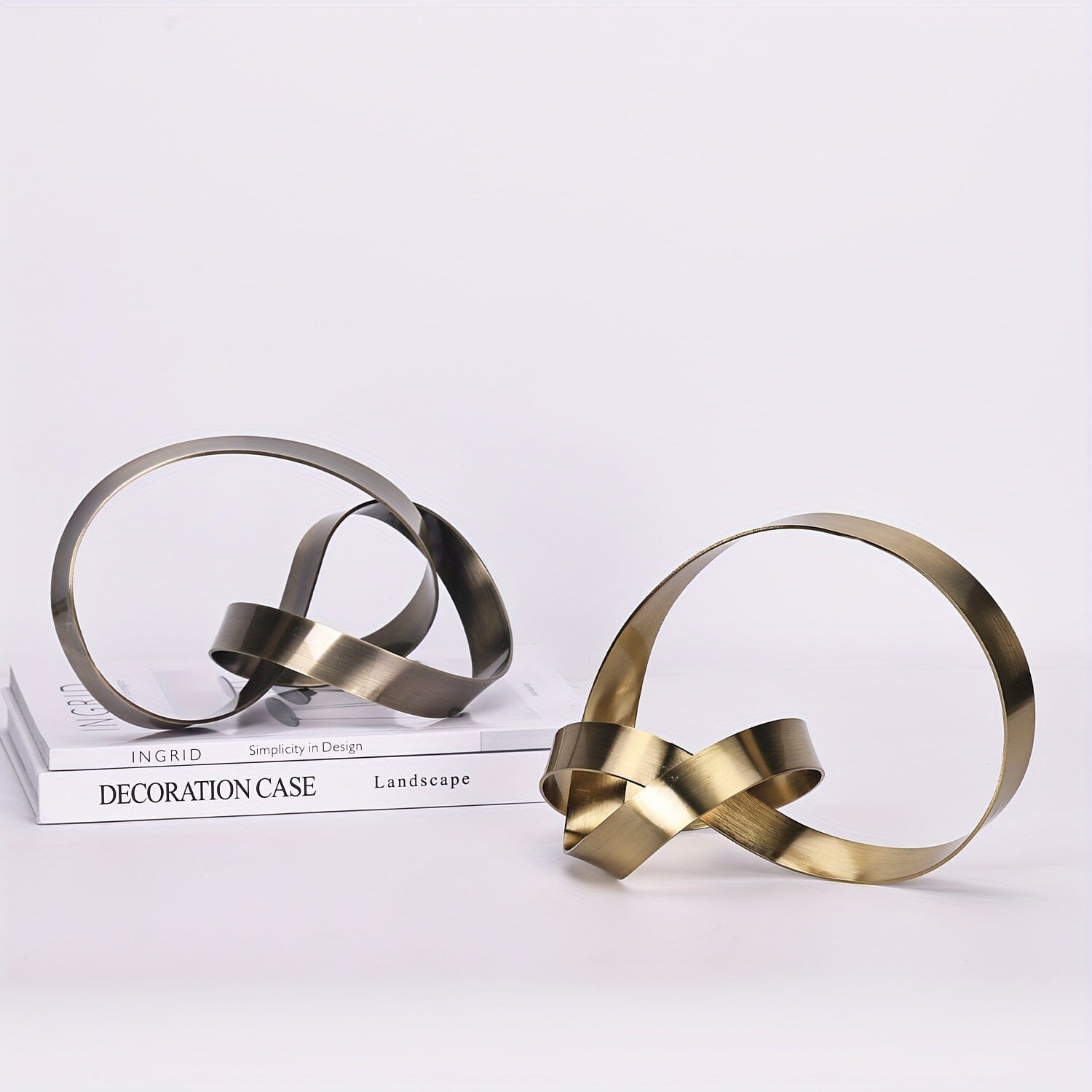 Escultura Moderna Abstrata em Metal -Nó Infinity Loja da Dryka 