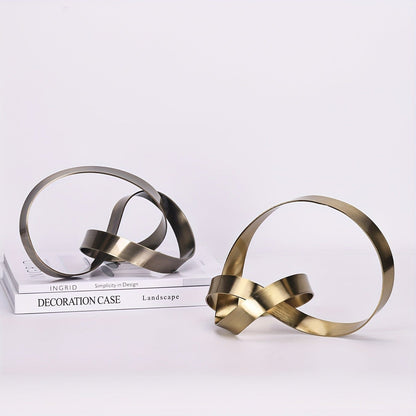 Escultura Moderna Abstrata em Metal -Nó Infinity Loja da Dryka 