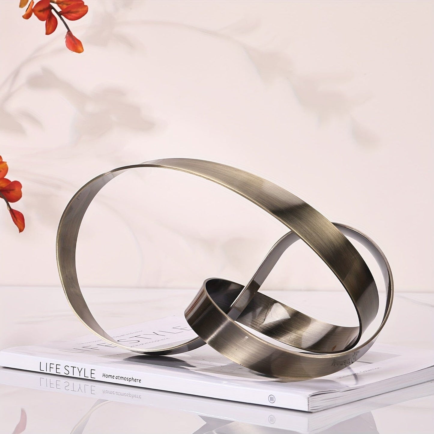 Escultura Moderna Abstrata em Metal -Nó Infinity Loja da Dryka 